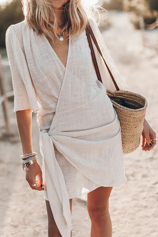 Women’s linen wrap mini dress with asymmetrical hem